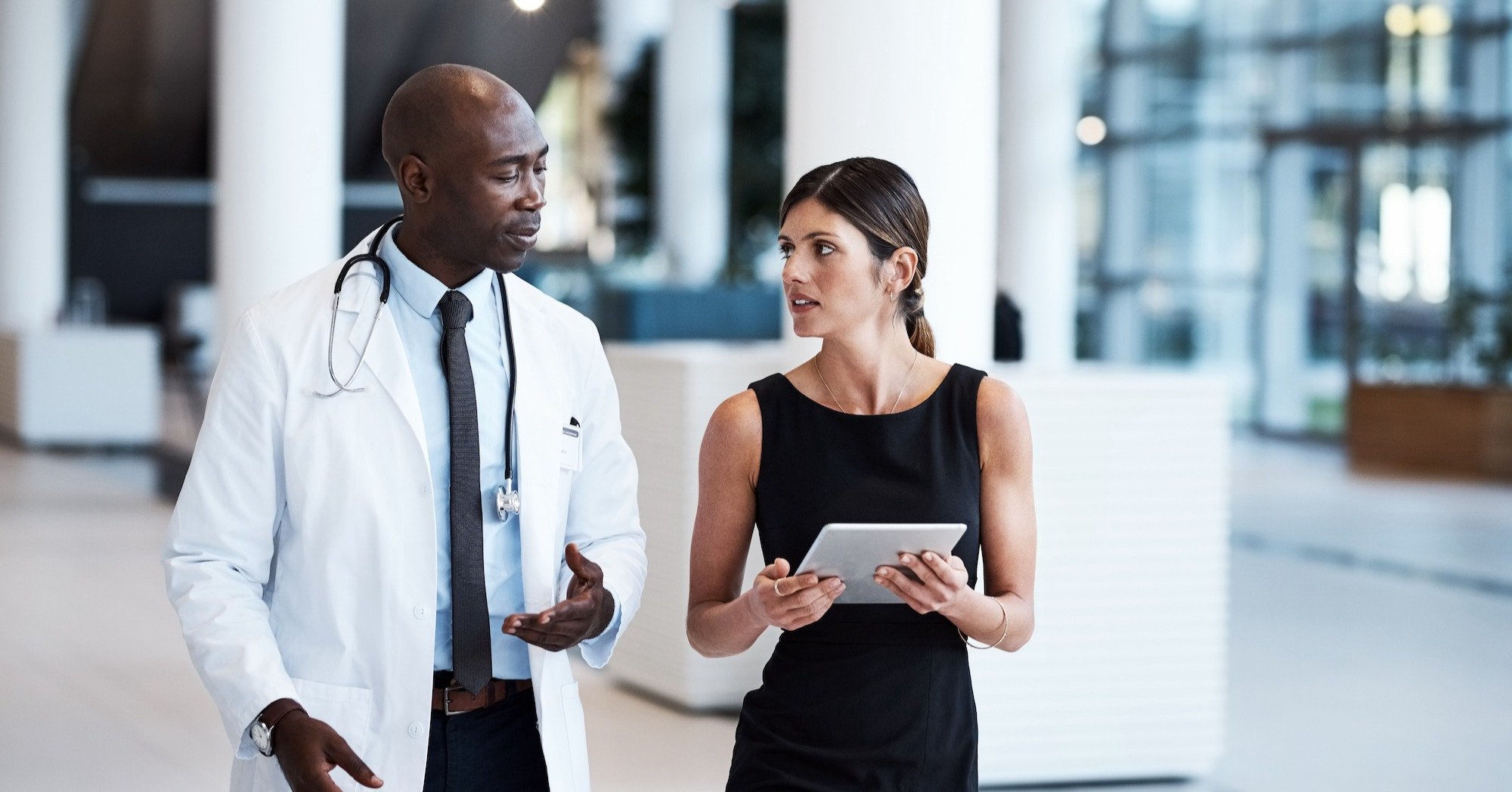 Physician consults with hospital administrator