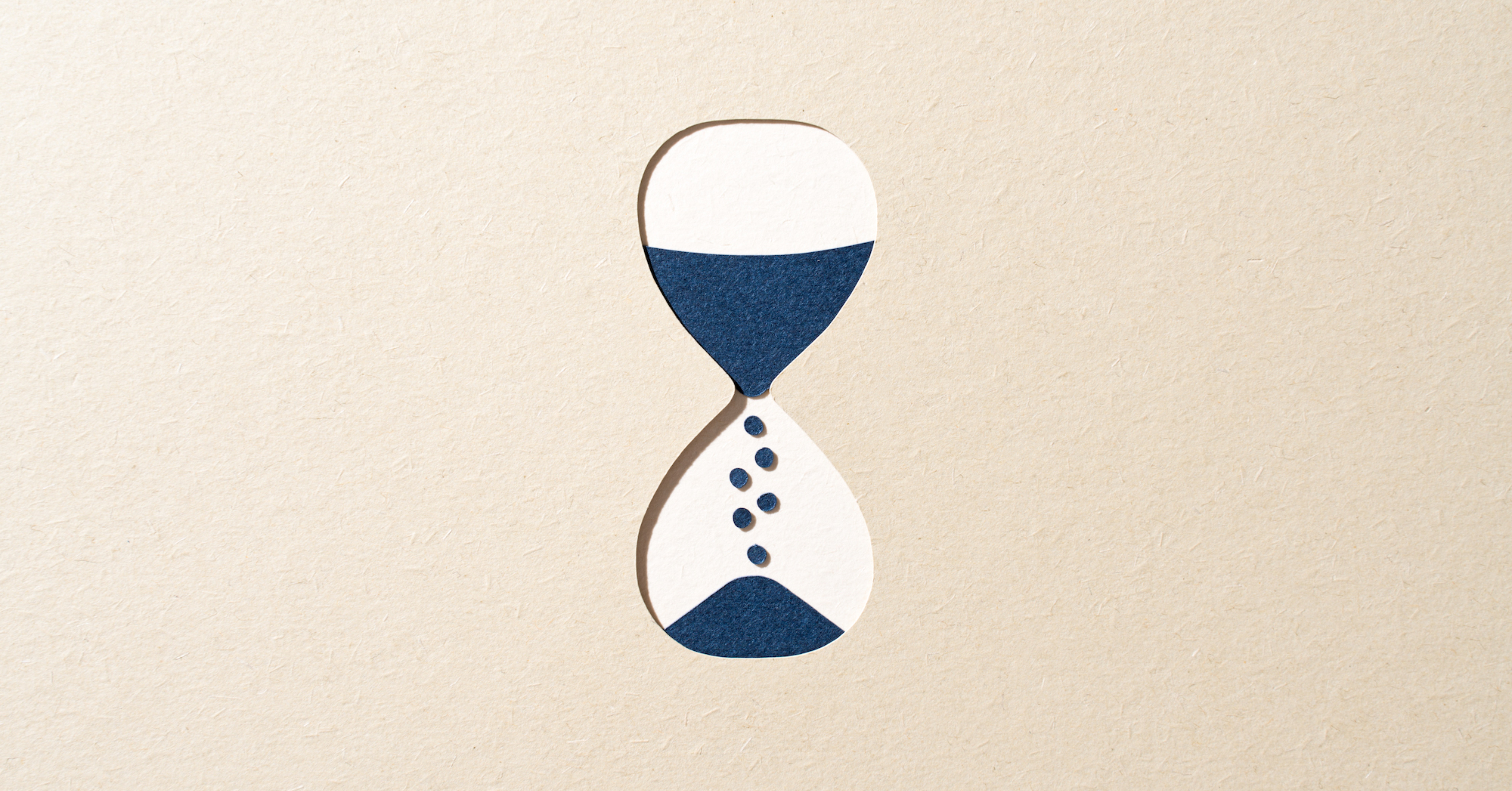 Paper cut out of an hourglass 